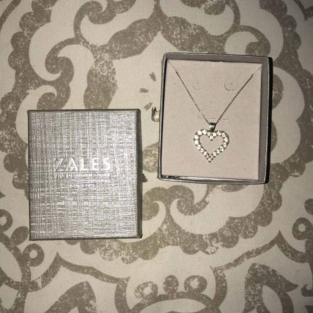 Zales 1/6 Diamond Lined Heart Pendant in 10k